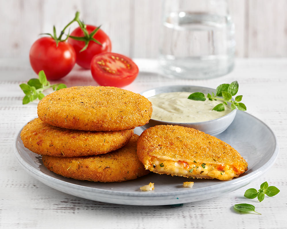 Krokante patty die de heerlijke smaken van mozzarella, tomaat en basilicum combineert.