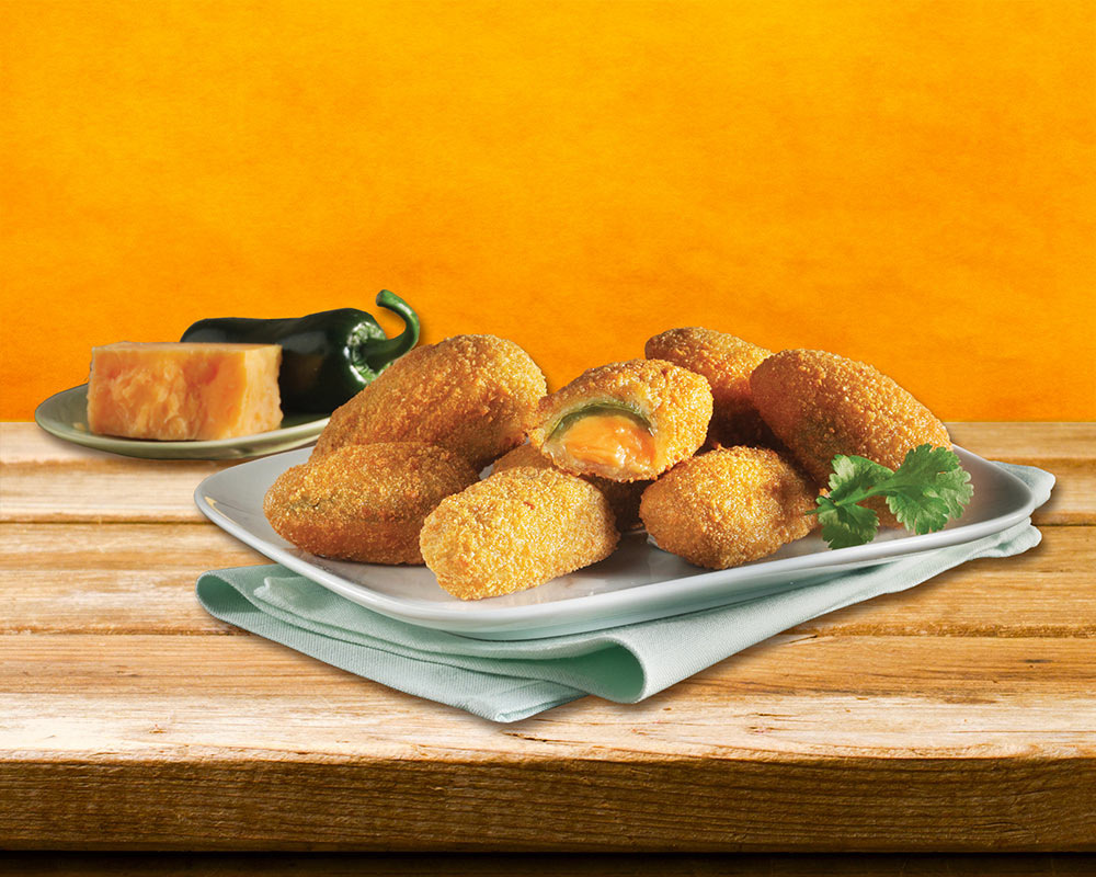 Crispy coated, slightly sour green Jalapeños filled with cheddar cheese.