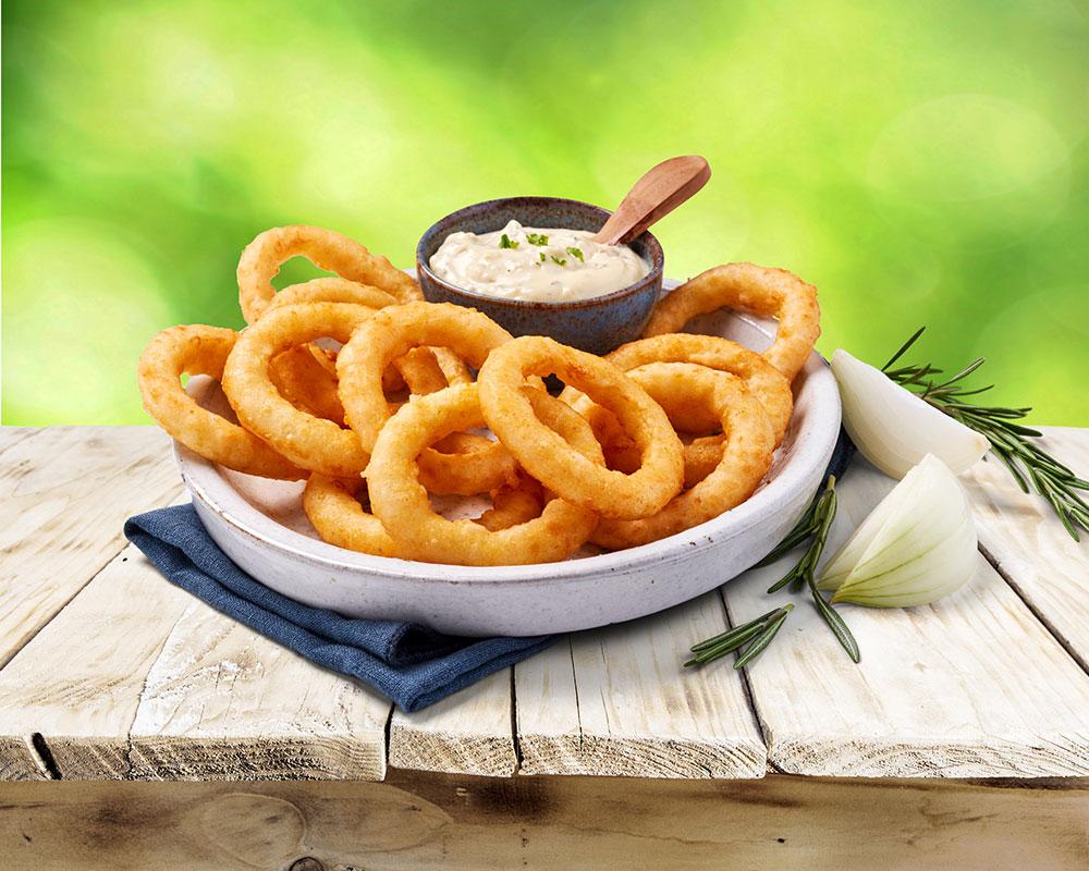 Giant formed onion rings with a crispy beer battered coating.